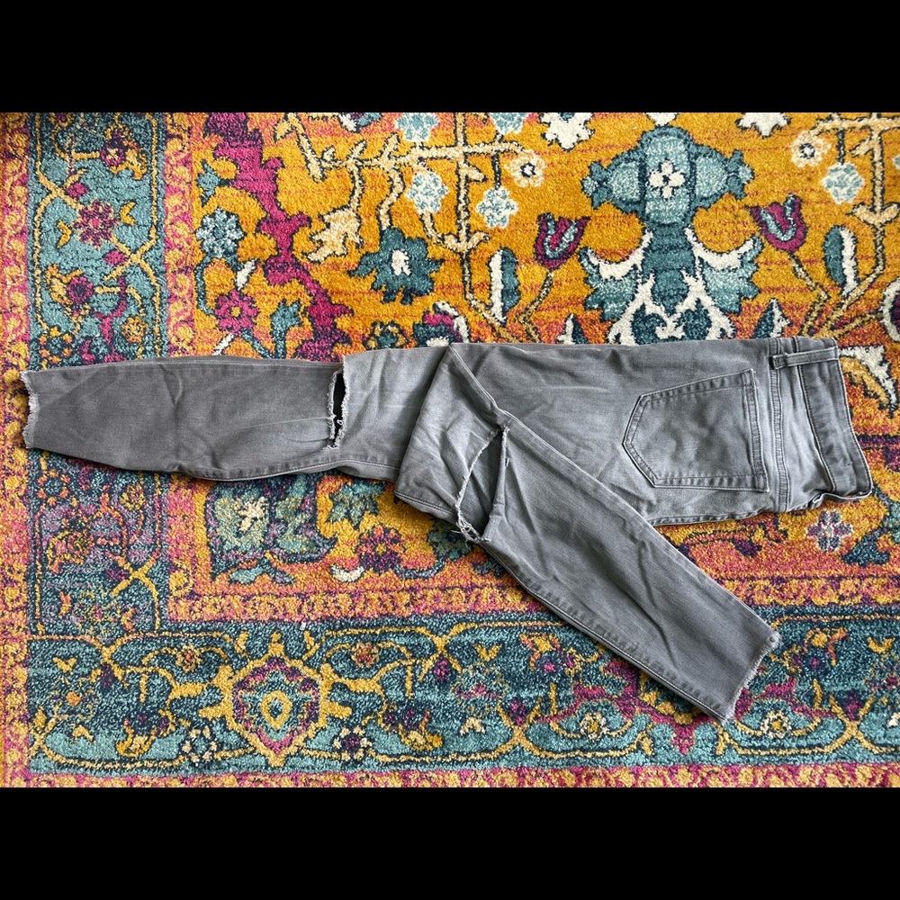 Joe’s Jeans light grey distressed skinny Jean in a size 25.